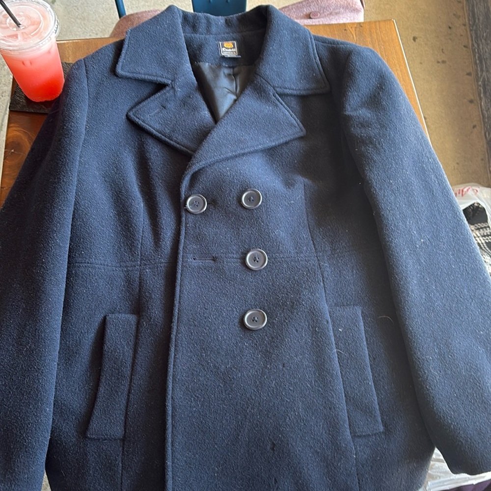 I am selling a pre owned, navy blue coat in great condition and waist length.